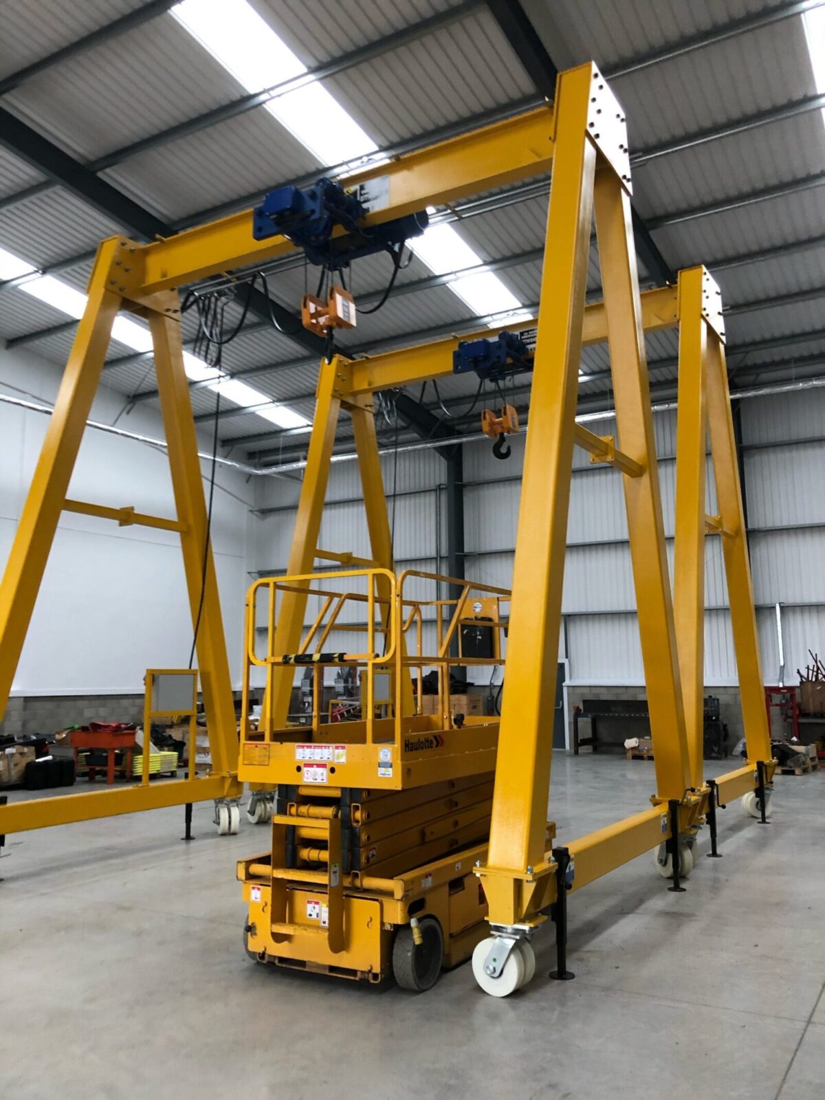 Cobal Cranes installed and operating a-frame gantry crane in an industrial warehouse 